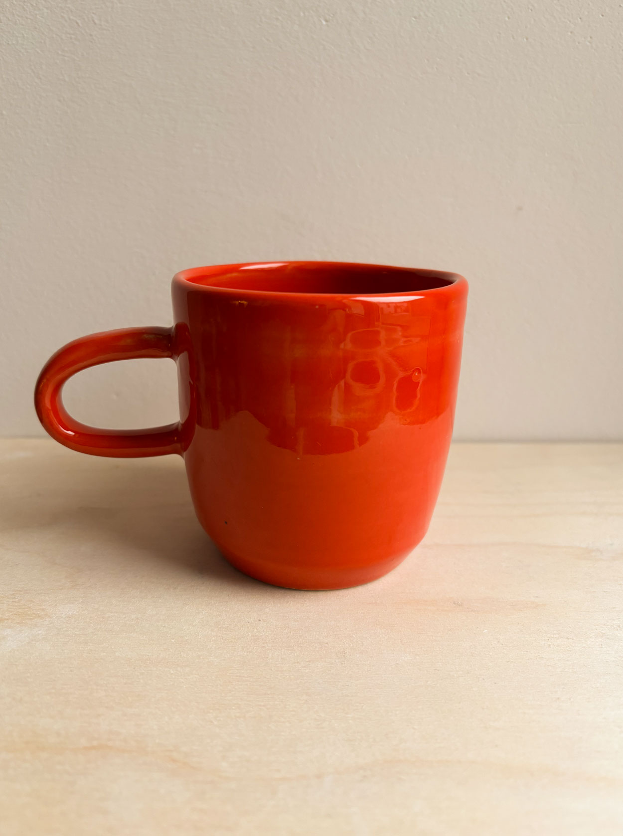 Pomarańczowy mini kubek z uchem